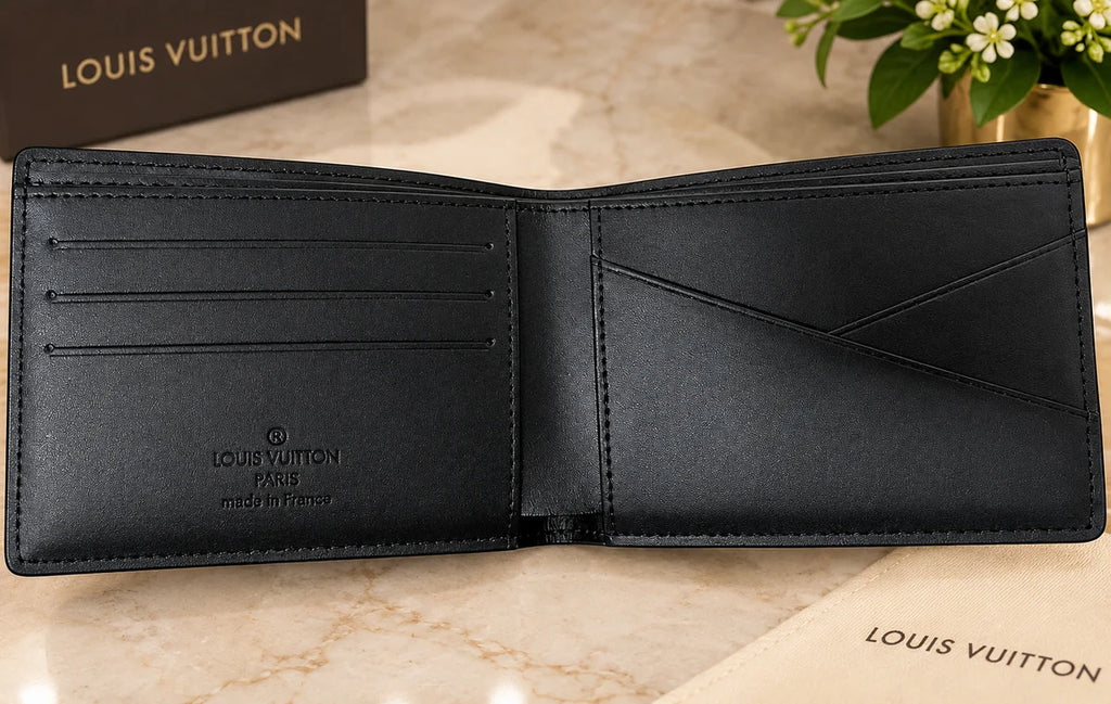 Louis Vuitton Black Monogram Embossed Bifold Men's Wallet – Designer Folding Wallet